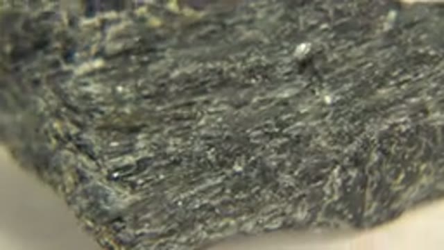 WESTMINSTER COLORADO-2015: Rotating Rock on White Floor with Black Glass