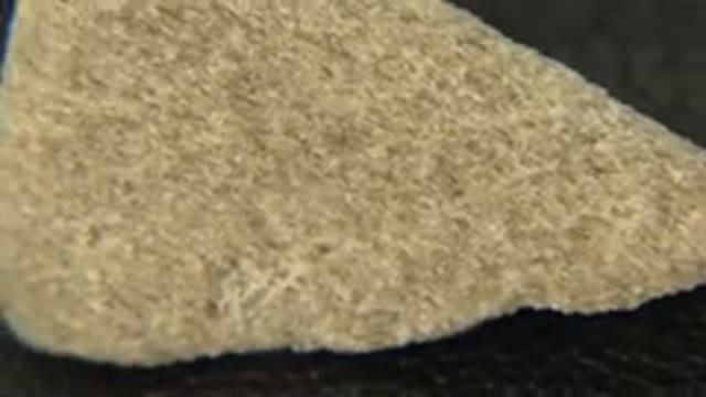 WESTMINSTER COLORADO-2015: Unusual Brownish White Rock On A Spinning Table