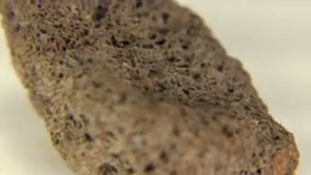 WESTMINSTER COLORADO-2015: Brown Chocolate-like Rock On A Spinning Table
