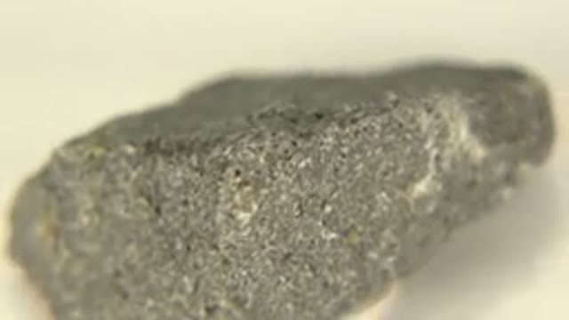 WESTMINSTER COLORADO-2015: Camera Pans Around Rock With White Specks Cracks And