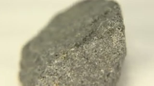 WESTMINSTER COLORADO-2015: Rotating Rock on White Floor with Black Granite