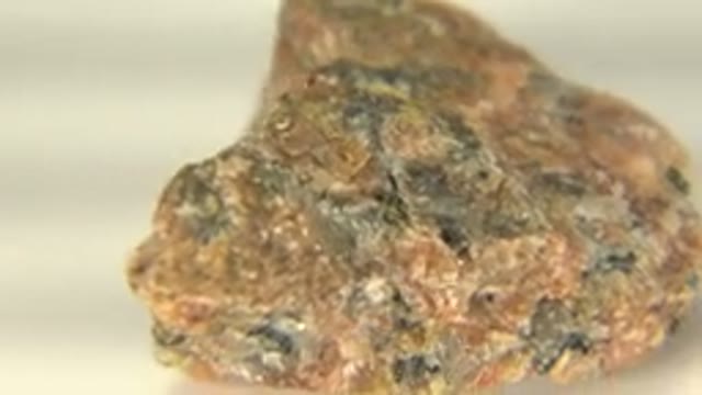 WESTMINSTER COLORADO-2015: Light Brown Rock On A Rotating Table
