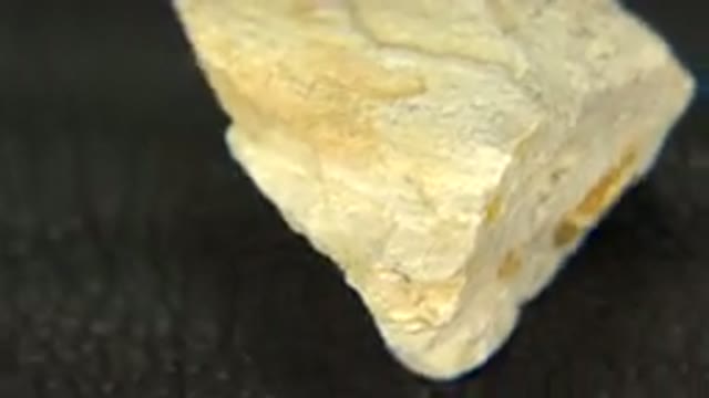 WESTMINSTER COLORADO-2015: A Yellow Sandstone Quartz Rotating On A Black Felt