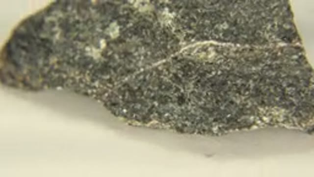 WESTMINSTER COLORADO-2015: Rotating Rock on White Floor with Black Granite Surface