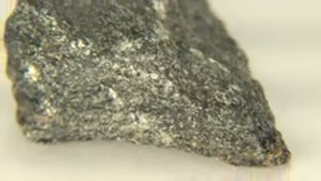 WESTMINSTER COLORADO-2015: A Close Up Display Of Dark Rough Rotating Rock On A