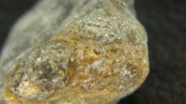 WESTMINSTER COLORADO-2015: A Stone With A Microscopic Image Showing The Details