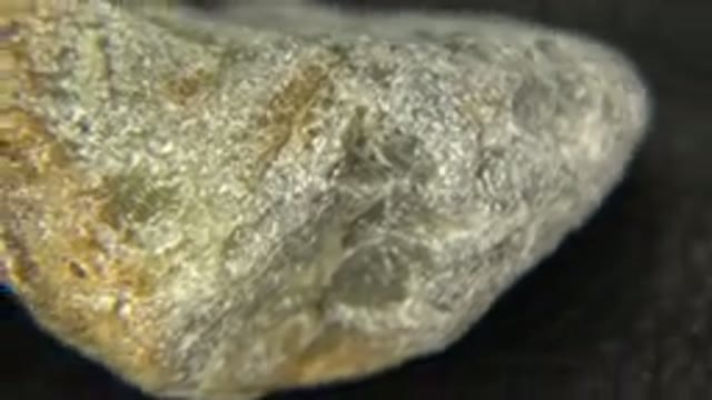 WESTMINSTER COLORADO-2015: Camera Rotates About A Gray Rock That Has Brown Specks