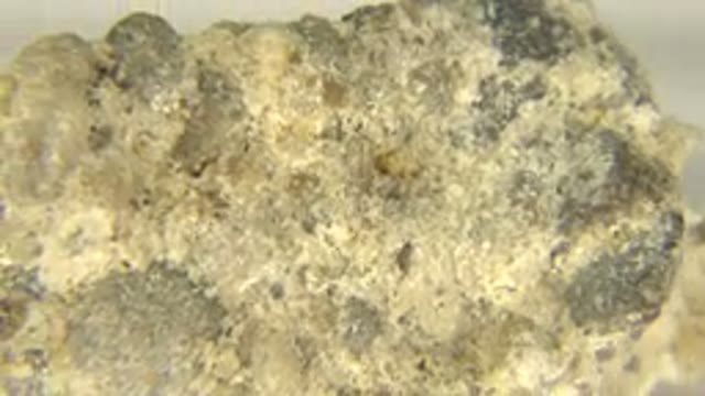 WESTMINSTER COLORADO-2015: Rotating Rock on White Floor with Yellow Sandy Texture