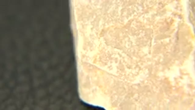 WESTMINSTER COLORADO-2015: Spinning Display Of A Gray Sedimentary Stone With Textured Surface