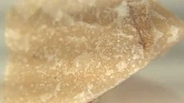 WESTMINSTER COLORADO-2015: Close Up Rotating Yellow Sandstone Quartz Rock