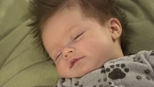 WESTMINSTER COLORADO-2015: A White Baby Smiling and Moving His Head