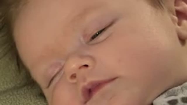 WESTMINSTER COLORADO-2015: Close Up View On An Adorable Baby Face Who Is About To Fall Asleep