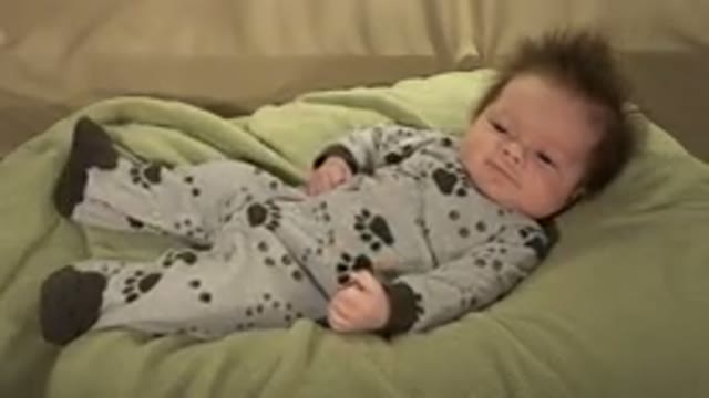 WESTMINSTER COLORADO-2015: Baby On A Bed Waking Up And Stretching After Sleeping