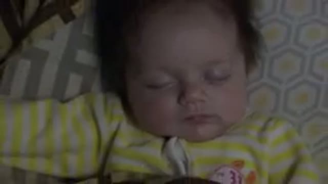 WESTMINSTER COLORADO-2015: Close Up Video Shot Of A Baby Sleeping On A Pillow
