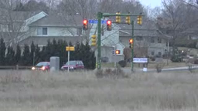 WESTMINSTER COLORADO-2015: Cars Moving on Highway Junction in Snowfall
