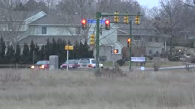 WESTMINSTER COLORADO-2015: People Driving Cars Throughout The City On A Cold Winter Day