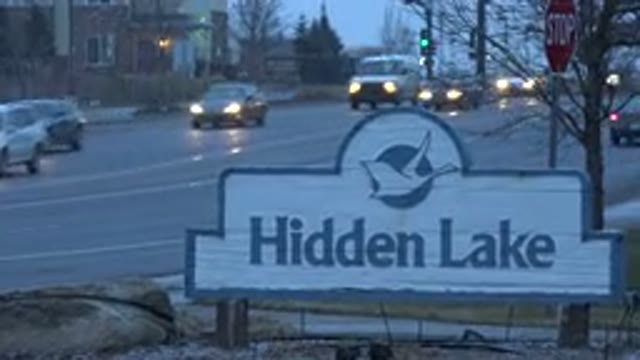 WESTMINSTER COLORADO-2015: Cars Driving On A City Road With Traffic