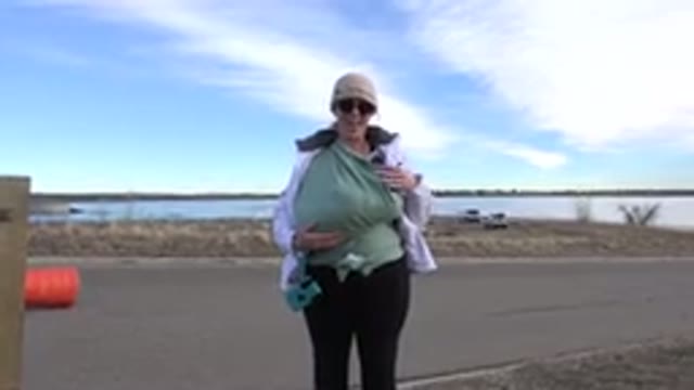 WESTMINSTER COLORADO-2015: Mom Carrying Her Baby on a Day's Walk