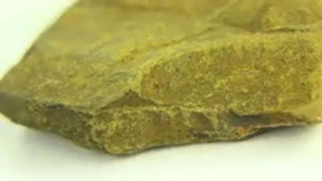 WESTMINSTER COLORADO-2015: A Close-Up of a Green Rock with a Spongy Basaltic Texture