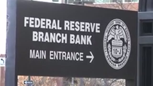 WESTMINSTER COLORADO-2015: Federal Reserve Bank Entrance With Black Glasses In
