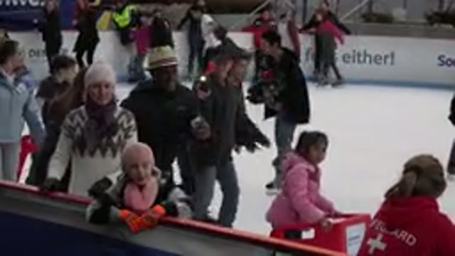 WESTMINSTER COLORADO-2015: Children Play Lively And Have Fun On An Ice Skating Rink