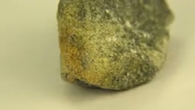 WESTMINSTER COLORADO-2015: Piece Of Grey Green Sandstone Rotating On A Flat