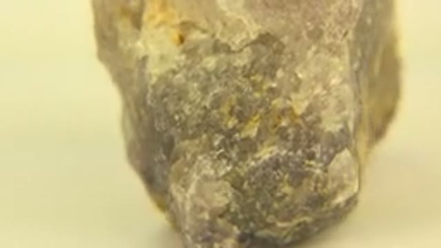 WESTMINSTER COLORADO-2015: Rotating Rock on Yellow Floor with White Granulated Material