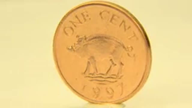 WESTMINSTER COLORADO-2015: A Gold Penny From The Olden Times Spinning Slowly