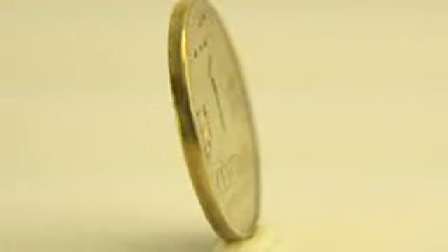 WESTMINSTER COLORADO-2015: One Centavo Coin Rotates Slowly