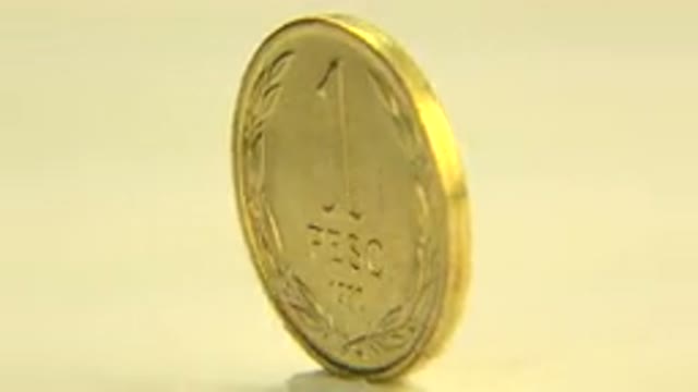 WESTMINSTER COLORADO-2015: Gold Chilean Peso Coin Rotating in Full View