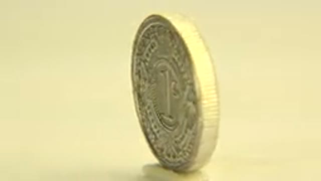 WESTMINSTER COLORADO-2015: Thicker Spinning Coin Rotating Like A Top On A Table