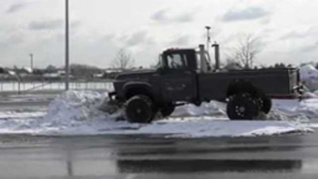 WESTMINSTER COLORADO-2015: A Truck Parked in a Snowy Lot