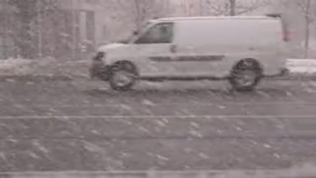 WESTMINSTER COLORADO-2015: Light Traffic During Snowstorm On A Cloudy Day