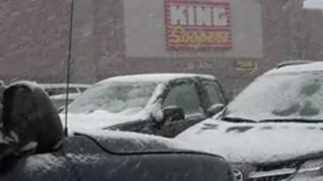 WESTMINSTER COLORADO-2015: Heavy Snowfall Covers Cars in Store Parking Lot