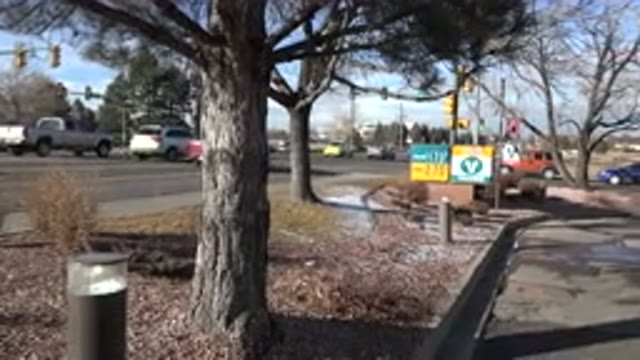 DENVER COLORADO-2015: Winter Morning Traffic in a Snow-Dusted Town