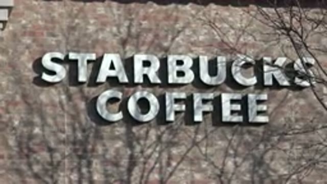 DENVER COLORADO-2015: The Facade Of A Coffee Shop In A City