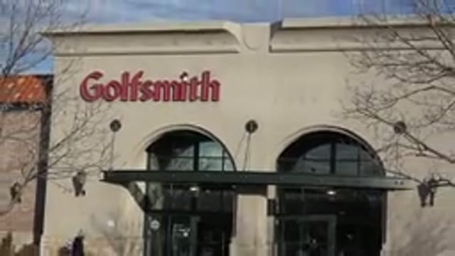 DENVER COLORADO-2015: A Man Entering A Building Named Goldsmith On The Street