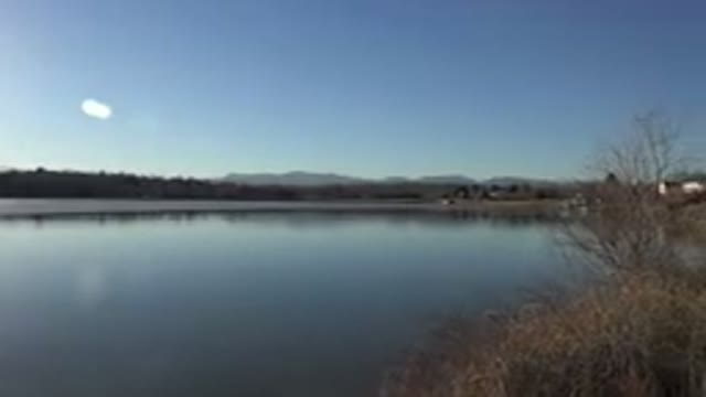 WESTMINSTER COLORADO-2015: Blue Lake Water And Brown Weed On A Clear Day