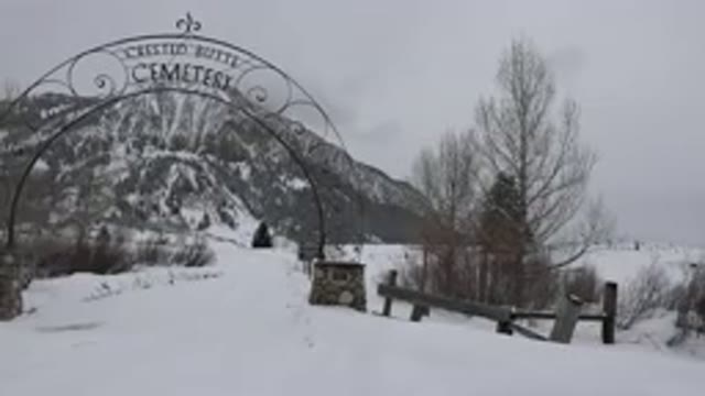 CRESTED BUTTE COLORADO-2015: A Cemetery With Large Black Iron Bars Covered With Snow