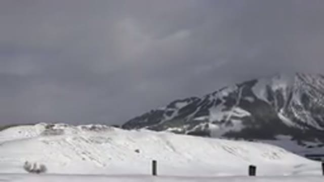 CRESTED BUTTE COLORADO-2015: Snow Covered Hills On A Cloudy Winter Day