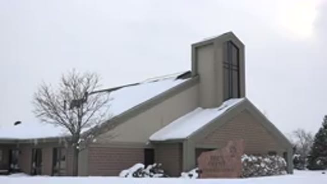 ARVADA COLORADO-2015: Church in the Snow in Winter Weather Close Up Building