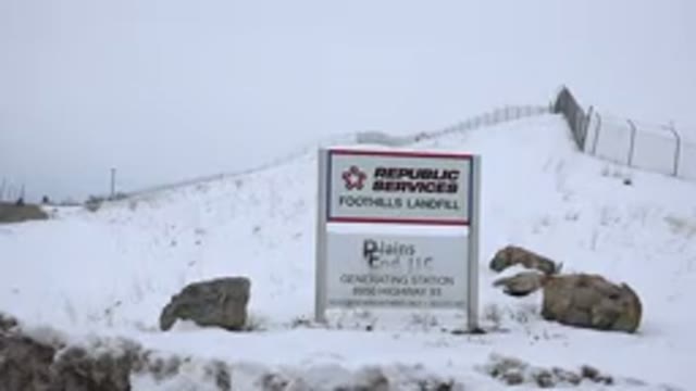 ARVADA COLORADO-2015: Advertisement Board On Top Of Snow Covered Mountain