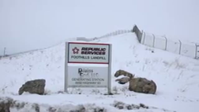 ARVADA COLORADO-2015: A Sign Behind a Snowy Hill in Winter Home Movie
