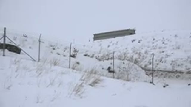 ARVADA COLORADO-2015: Panoramic Car Crossing Road Between Snow-Covered Hills