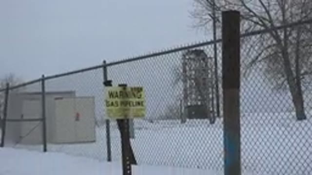 ARVADA COLORADO-2015: A Fence On Snow Covered Place With Advertisement Board