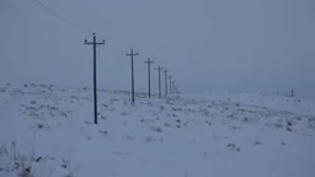 ARVADA COLORADO-2015: Snowy Landscape Showing Desolate Area With Lots Of Telephone Poles