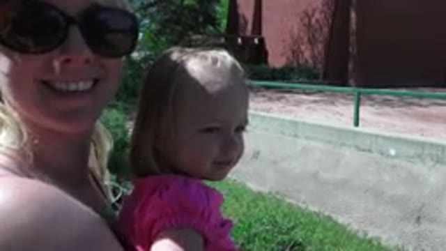 WESTMINSTER COLORADO-2016: Mother Smiling With Her Female Child On Her Lap And