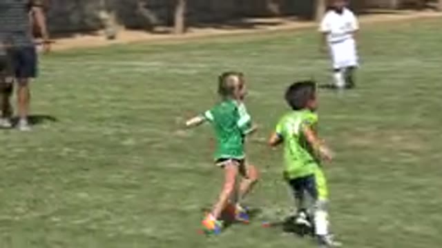 SAN JOSE DEL CABO MEXICO-2019: Little Kids Playing Soccer On A Grass Field
