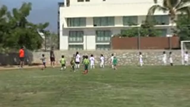 SAN JOSE DEL CABO MEXICO-2019: Enthusiastic Boy Making A Corner Shot During A Soccer Game