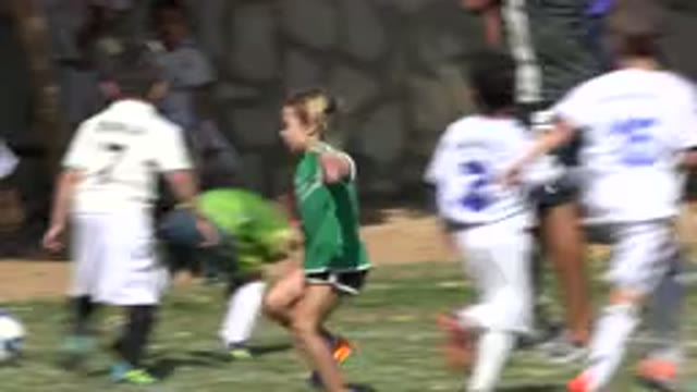 SAN JOSE DEL CABO MEXICO-2019: A Girl Playing Soccer With The Boys On A Sunny Day